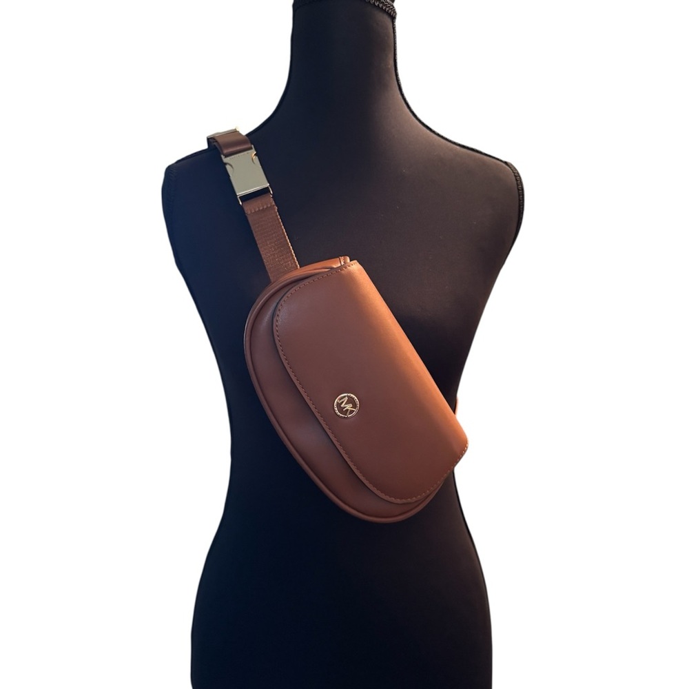 Michael Kors Brown Leather Waist bag or sling bag in Camel leather.